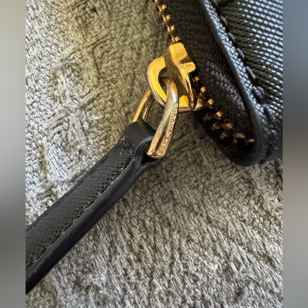 The Marc Jacobs Saffiano Leather Zip Around
Continental Wallet - $195 MSRP - Picture 4 of 8